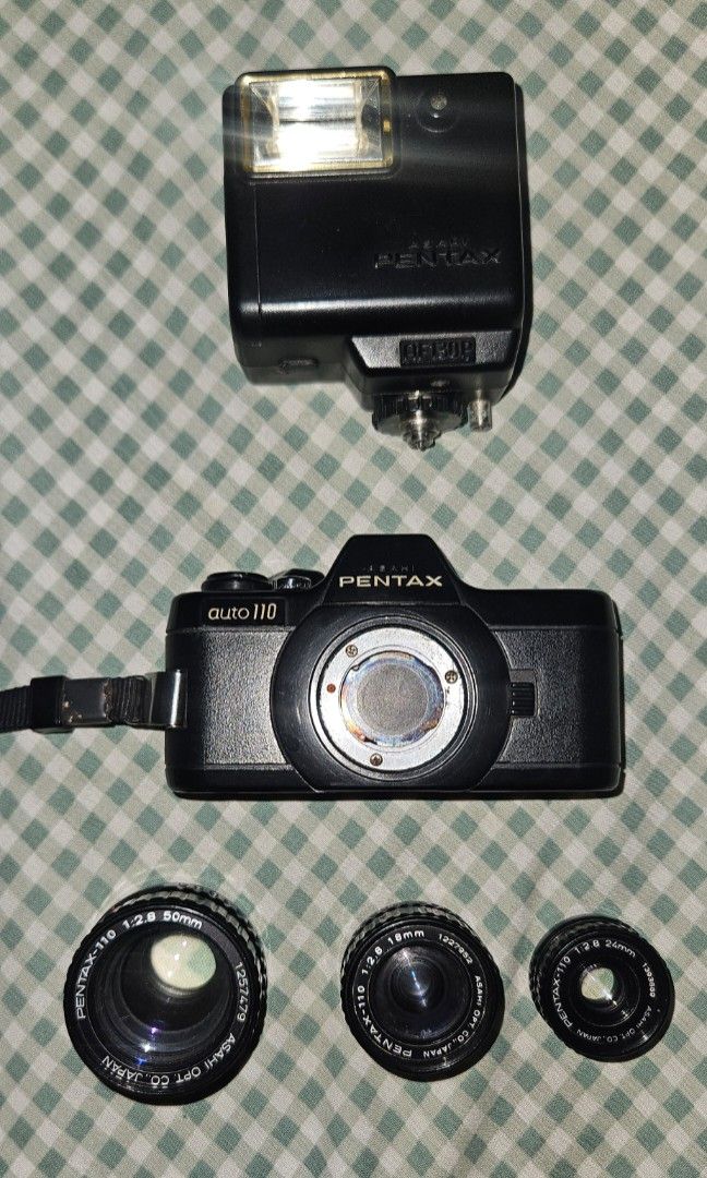 Pentax Auto 110 Camera with Lenses and Flash (Category: Cameras) located in Bacolod City. Submitted by sammrenee25 (Listing ID 1444712502, Image 2). Description: - Pentax Auto 110 camera body - Two lenses included with lens cap - Pentax flash unit included This was my mom's from way back then. With 2 new batteries installed but no film. I am not a camera enthusiast so I don't really know how to test or work it..