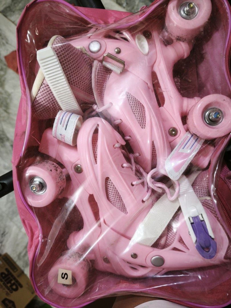 Pink Adjustable Roller Skates with Bag Size S (Category: Skates, Rollerblades & Scooters) located in Manila. Submitted by bananai (Listing ID 1459798875, Image 2). Description: - Pink roller skates for kids - Adjustable size S - Comes with a pink carrying bag - Secure straps - Ready for fun skating! - Fits size 27-30.