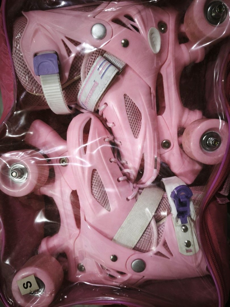 Pink Adjustable Roller Skates with Bag Size S (Category: Skates, Rollerblades & Scooters) located in Manila. Submitted by bananai (Listing ID 1459798875, Image 1). Description: - Pink roller skates for kids - Adjustable size S - Comes with a pink carrying bag - Secure straps - Ready for fun skating! - Fits size 27-30.