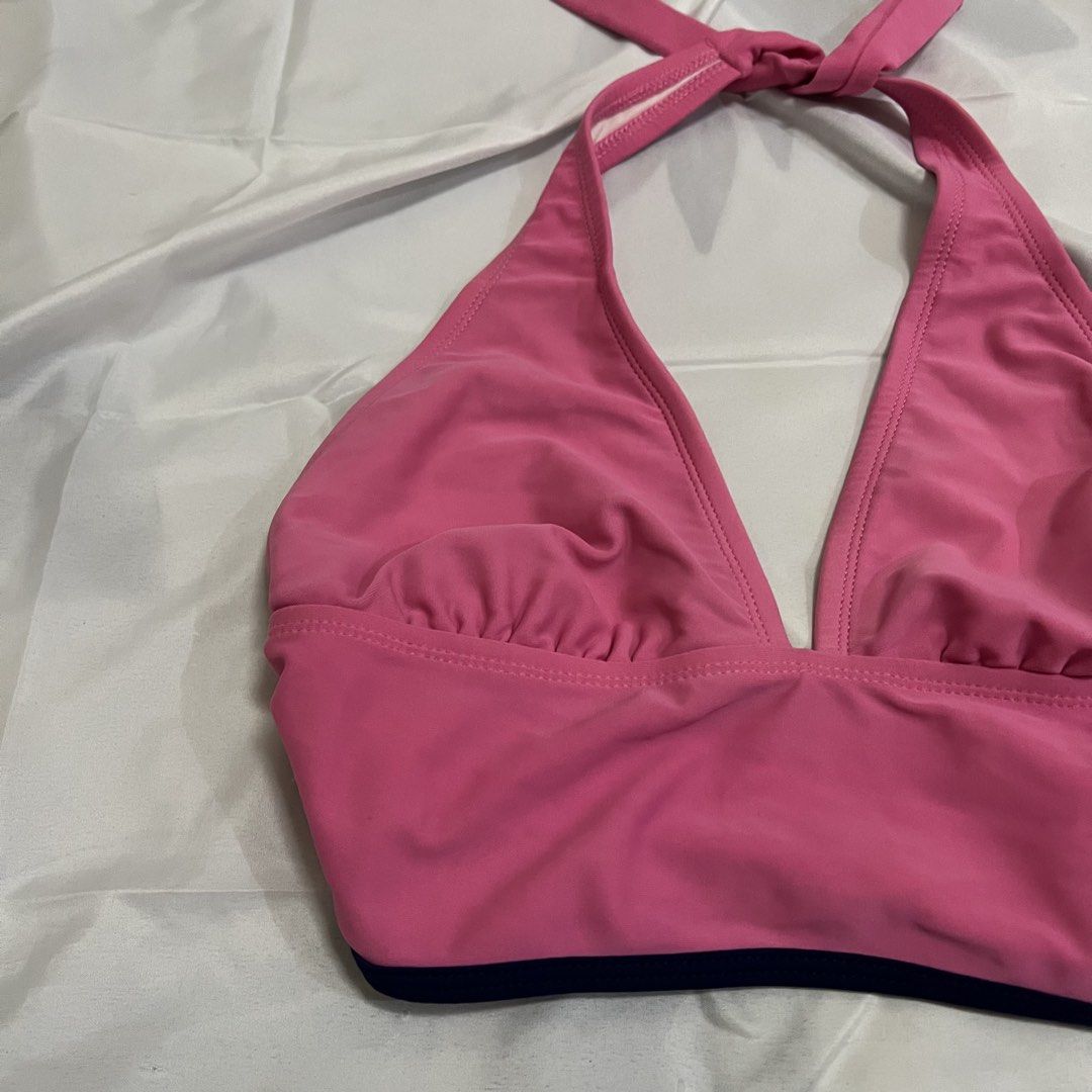 Pink Halter Bikini Top with Navy Trim (Category: Bikinis & Swimsuits) located in Imus. Submitted by niftees.eco (Listing ID 1459749768, Image 2). Description: - Cute pink halter bikini top - Ties at neck and back - Ruching detail on cups - Navy blue trim along bottom edge - Ideal for beach or pool.