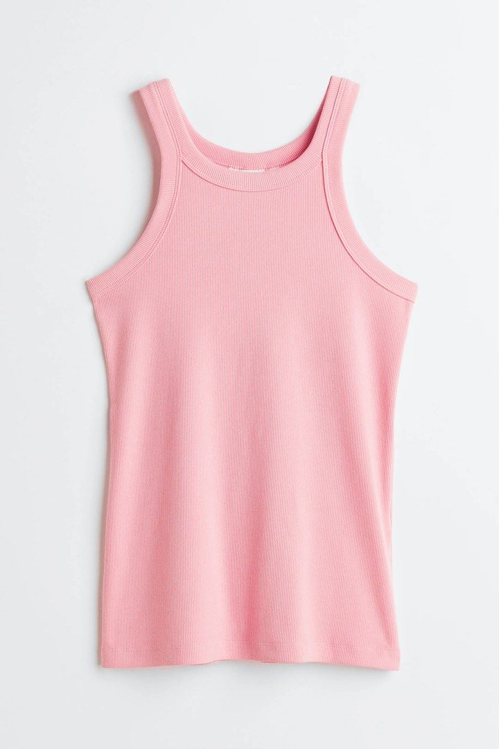 Pink Ribbed Tank Top (Category: Sleeveless) located in Cebu City. Submitted by myclothesdump12 (Listing ID 1459756950, Image 1). Description: - Soft pink ribbed tank top - High neckline - Racerback style - Stretchy material for a comfortable fit - Perfect for layering or wearing solo - Casual and easy to wear.