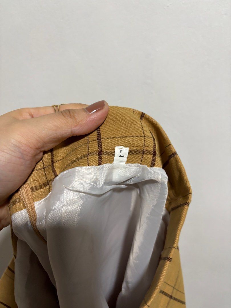 Plaid Skirt with Ruffle Hem (Category: Skirts) located in Cavite. Submitted by aceepreeloved (Listing ID 1459782424, Image 3). Description: Size: Large on tag, but best fit Medium Waist: 13.5 in Hips: 18 in Length: 16 in.