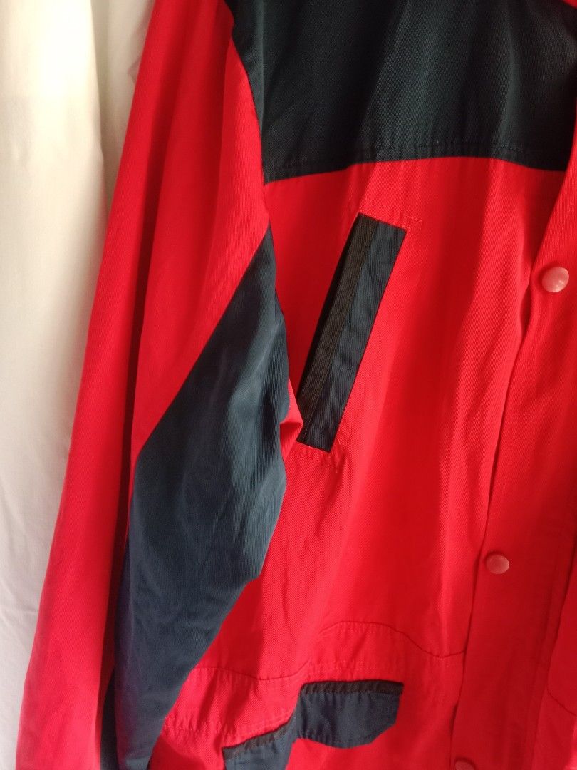 plain red and navy blue oversize windbreaker jacket (Category: Coats, Jackets and Outerwear) located in Bontoc. Submitted by irene_banganan (Listing ID 1459865018, Image 3). Description: plain red and navy blue oversize windbreaker jacket size xxl 180/88A shoulder: 40" wide | 34" long fully lined, makapal, mabigat well made, complete buttons no flaws, excellent condition.
