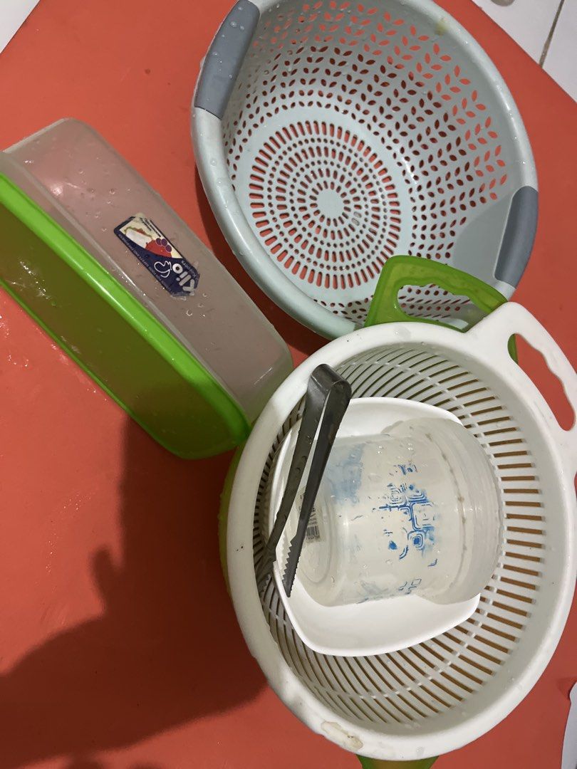 Plastic Colanders and Food Container Set (Category: Other Kitchenware & Tableware) located in Manila. Submitted by jana0011 (Listing ID 1459857366, Image 1). Description: - Set includes two plastic colanders (one grey handle, one white). - Comes with a rectangular food container with a green lid. - Food container has some water marks. - Ideal for draining fruits, vegetables, and storing food items..