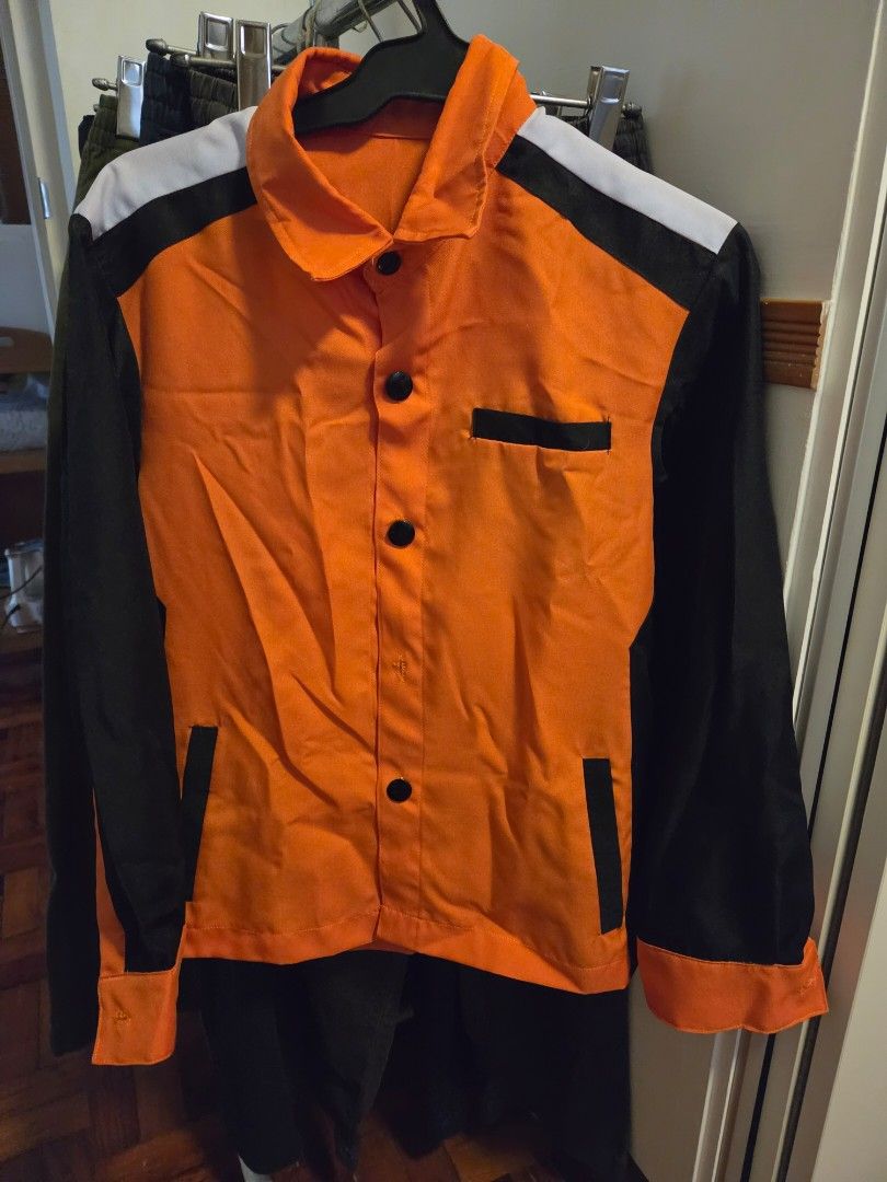 PLV OJT UNIFORM (Category: Looking For) located in Caloocan City. Submitted by mluck (Listing ID 1459700005, Image 3). Description: width : 19inches c length: 24 inches - Stylish orange jacket with contrasting black sleeves and collar. - White stripe detail across the shoulders for a sporty look. - Two chest pockets with black button closures. - Front closure with black buttons. - Ideal for a cool, casual everyday outfit..