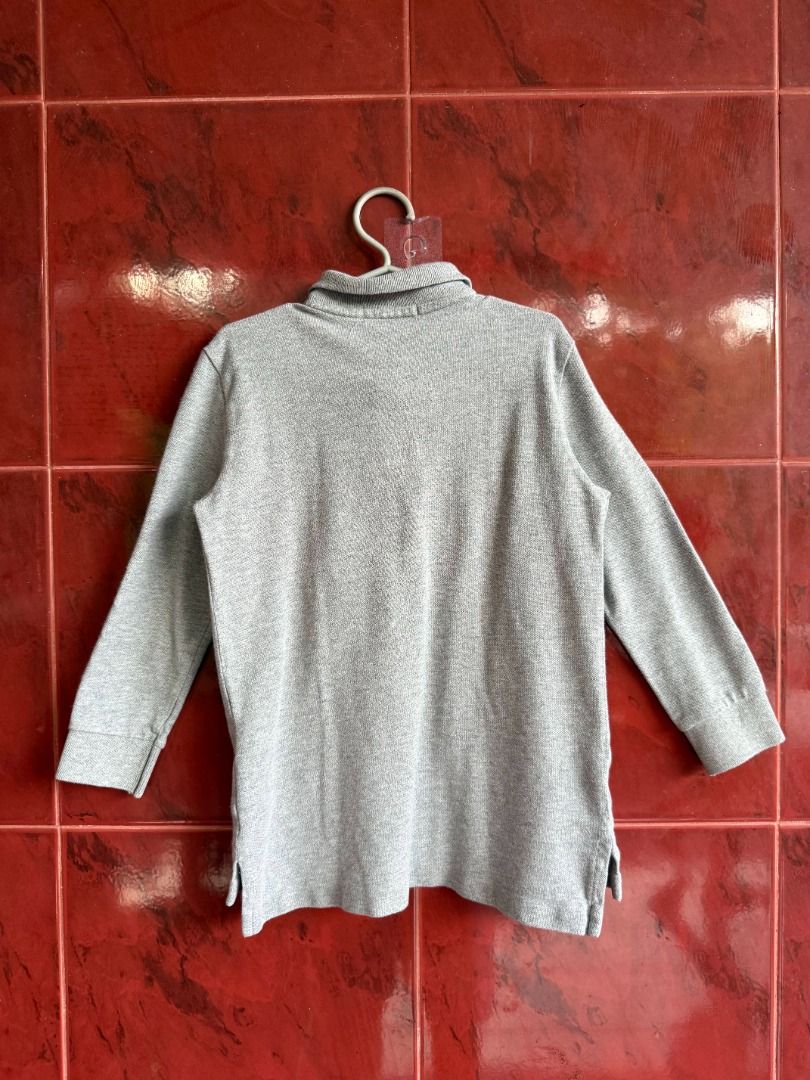 Polo Ralph Lauren Grey Sweater (Category: Coats, Jackets and Outerwear) located in Caloocan City. Submitted by tinythreadsco. (Listing ID 1459852216, Image 3). Description: - Brand: Polo Ralph Lauren - Color: Grey - Dimes: L-19.5, W - 13.5 - Ideal for: Everyday wear - Details: Cut tags .