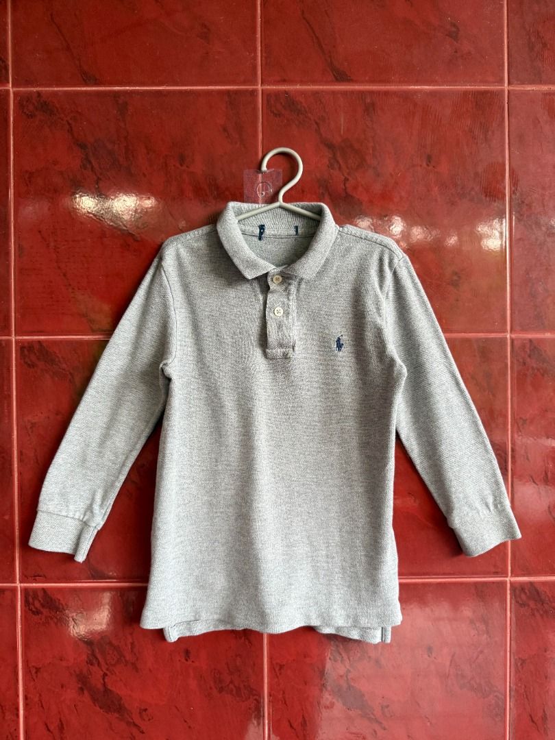 Polo Ralph Lauren Grey Sweater (Category: Coats, Jackets and Outerwear) located in Caloocan City. Submitted by tinythreadsco. (Listing ID 1459852216, Image 1). Description: - Brand: Polo Ralph Lauren - Color: Grey - Dimes: L-19.5, W - 13.5 - Ideal for: Everyday wear - Details: Cut tags .