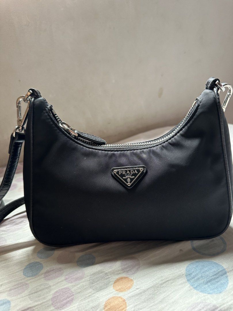 Prada ( RE EDITION ) (Category: Luxury Bags & Wallets) located in Cainta. Submitted by 3rd_street.onlineshop (Listing ID 1459705292, Image 1). Description: Lampo underzip Issue: replace sling And Normal signs of usage Sf not included Payment first .