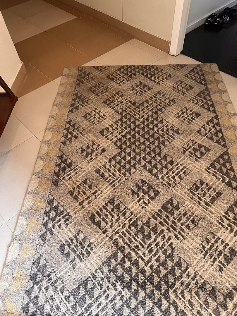 Preloved Crate and Barrel 6x9 ft carpet (Category: Carpets, Mats & Flooring) located in Pasig City. Submitted by anazareno (Listing ID 1459695732, Image 1). Description: Preloved Crate and Barrel 6x9 ft carpet - Capers Wool Rug” design - Material: 100% wool surface pile (woven into a sturdy cotton/latex backing) - Construction: Hand-hooked / Micro-loop pile. - Colors: A multi-tonal neutral palette featuring charcoal gray, soft beige/taupe, ivory,