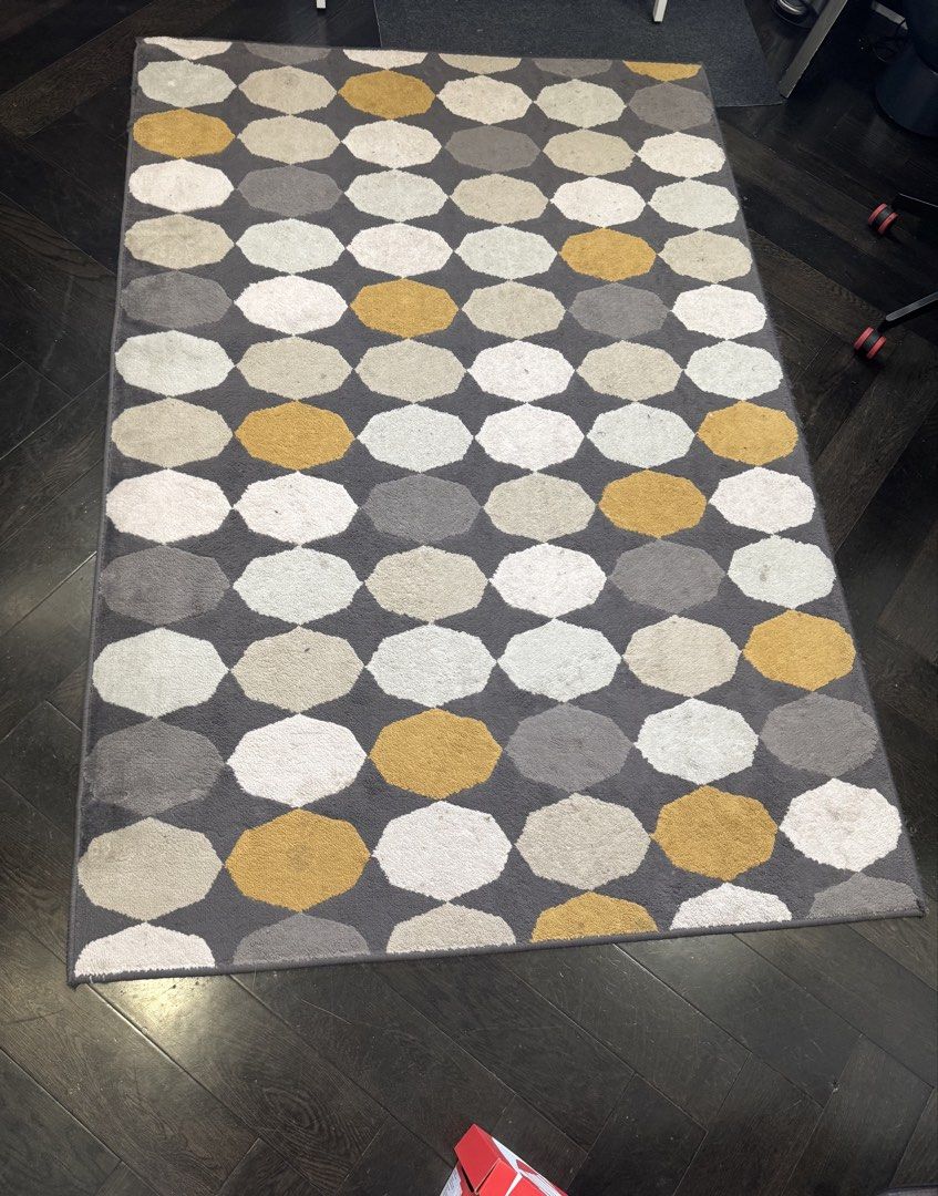 Preloved IKEA Torrild carpet (Category: Carpets, Mats & Flooring) located in Pasig City. Submitted by anazareno (Listing ID 1459698167, Image 1). Description: Preloved IKEA Torrild low-pile rug - Dimensions: 133cm x 195cm - 3.5 yrs old - Needs cleaning - Material: Typically constructed from 100% polypropylene with a low pile - Design: geometric pattern in shades of gray, white, beige, and mustard yellow.