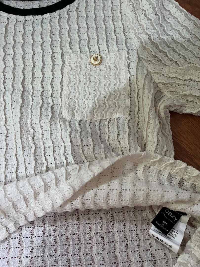 Preloved Textured Knit Top | Cream & Black#1 (Category: Luxury Apparel) located in Caloocan City. Submitted by outfitloop (Listing ID 1459759034, Image 3). Description: • Color: Cream with black trim • Condition: Good condition • Textured knit fabric • Short sleeves • Black contrast neckline & sleeve details • Perfect for casual & everyday outfits ✨ 📌 IMPORTANT: • 1st photo is an AI styling/model preview for reference on how the item may look wh