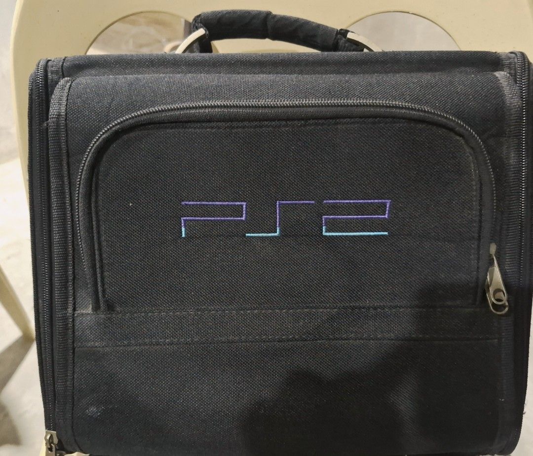 Ps2 bag (Category: Cases & Covers) located in Antipolo. Submitted by lakay_toys (Listing ID 1459852133, Image 1). Description: For sale : Playstation 2 bag Good condition Fit for ps2 phat units and accesories Can also put slim units Price :1500 Kindly pm for more details WARRANTY: 1 day warranty CONTACT NUMBER: will be given to the buyer MEET-UP LOCATION: Lower antipolo city Pickup ,shipping or lalamove (FLASH EXPRESS /J&T REGULAR COURIER) LALAMO