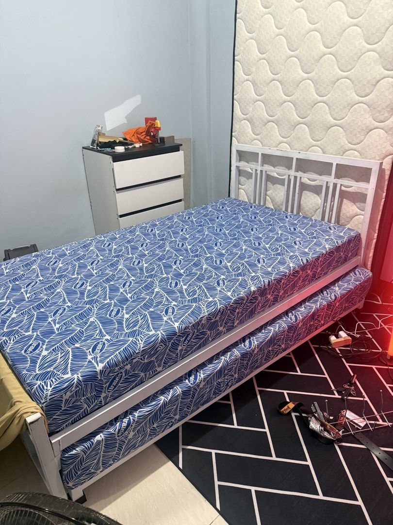 Pull-Out Bed with 2 Mattresses – Good Condition (Category: Bed Frames & Mattresses) located in Manila. Submitted by mikey1997 (Listing ID 1459889885, Image 1). Description: 🛏️ Pull-Out Bed with 2 Mattresses for Sale Preloved pull-out bed in good condition. ✅ Complete with main bed + pull-out bed ✅ Includes 2 mattresses ✅ Main mattress is Uratex ✅ Still sturdy and functional ₱10,000 negotiable 📍 QC 🚚 Buyer shoulders delivery/pickup fee PM for i