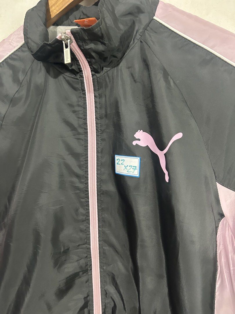 Puma Track Jacket Black Pink Windbreaker (Category: Coats, Jackets and Outerwear) located in Mandaluyong City. Submitted by 0lg2026 (Listing ID 1459689451, Image 3). Description: - Puma Track Jacket - Color: Black with Light Pink Accents - Full Zip Front with Branded Pull - Puma Logo on Chest - Lightweight Material - Ideal for Casual Wear or Sports - Made in China.