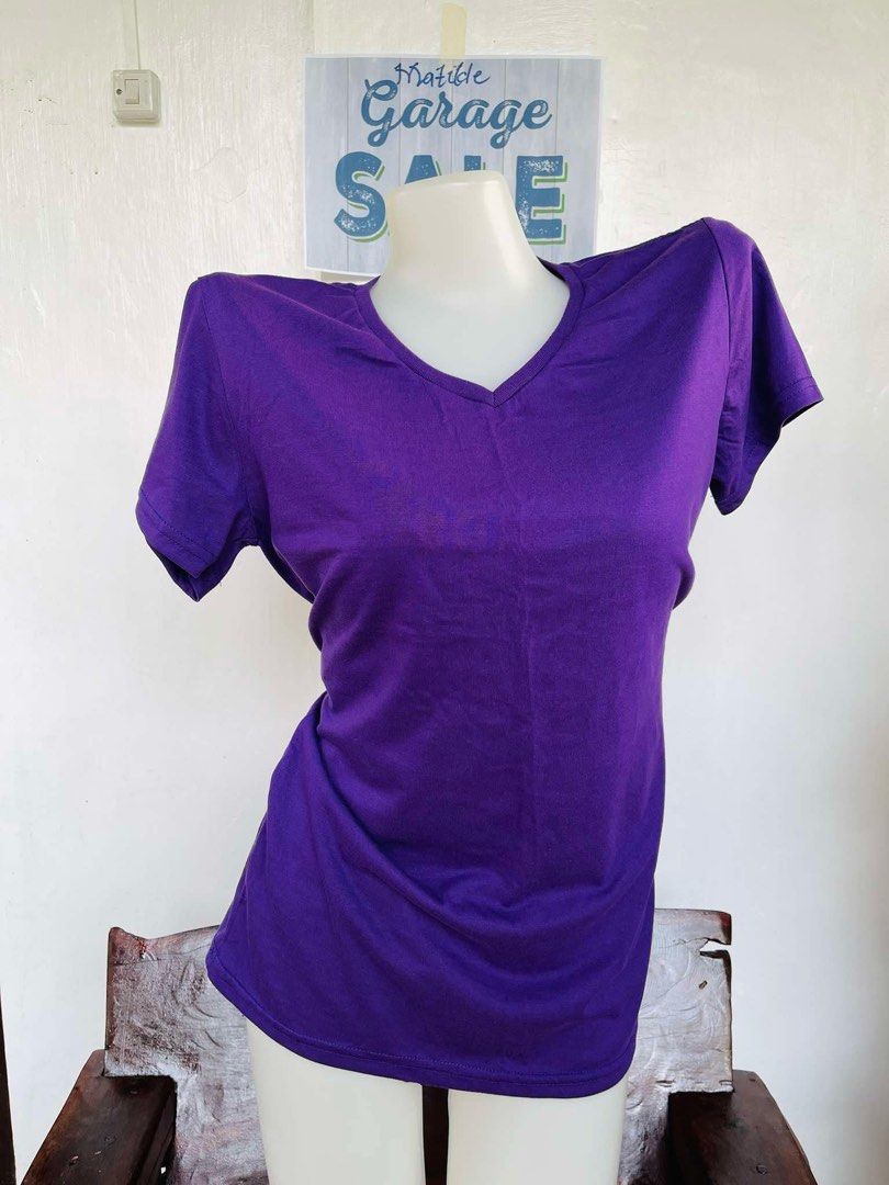 Purple V-neck T-shirt (Category: Shirts) located in Indang. Submitted by matilde.sshop (Listing ID 1459862405, Image 1). Description: - Basic purple v-neck t-shirt - Short sleeves - Simple and versatile design - Ideal for layering or wearing solo - Effortlessly matches with any outfit - Great for everyday wear.