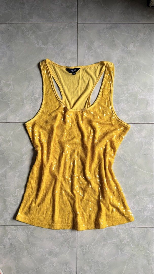 R&B Yellow Sequin Racerback Tank Top (Category: Sleeveless) located in General Santos City (Dadiangas). Submitted by ssssshhhhhhhhh (Listing ID 1459752816, Image 1). Description: - Eye-catching yellow tank top - All-over sequin embellishments - Stylish racerback design - Estimated size: 16 - Ideal for parties and nights out - Comfortable and dazzling - A fun addition to your wardrobe!.