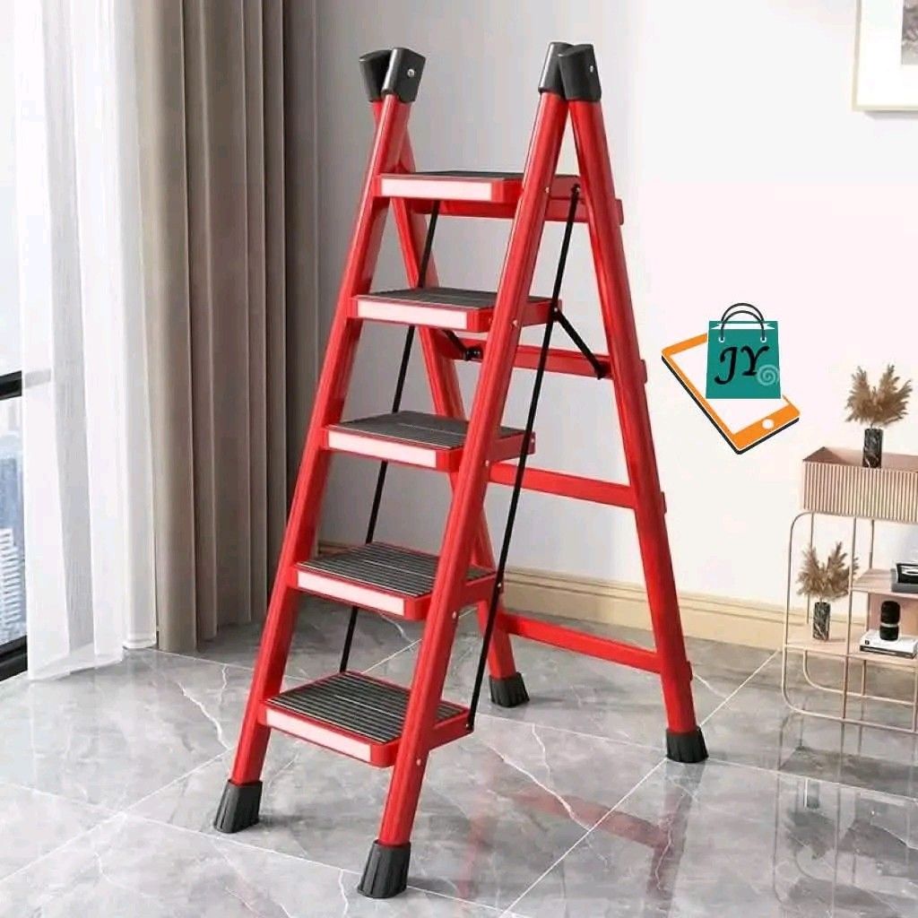 Red 5-Step Folding Ladder (Category: Other Home Furniture) located in Manila. Submitted by marvieobordo (Listing ID 1459726028, Image 3). Description: - Red 5-step folding ladder - 102cm tall when open - Folds down to 128cm for convenient storage - Non-slip steps ensure safety - Ideal for reaching high shelves and DIY projects - Sturdy and reliable construction.