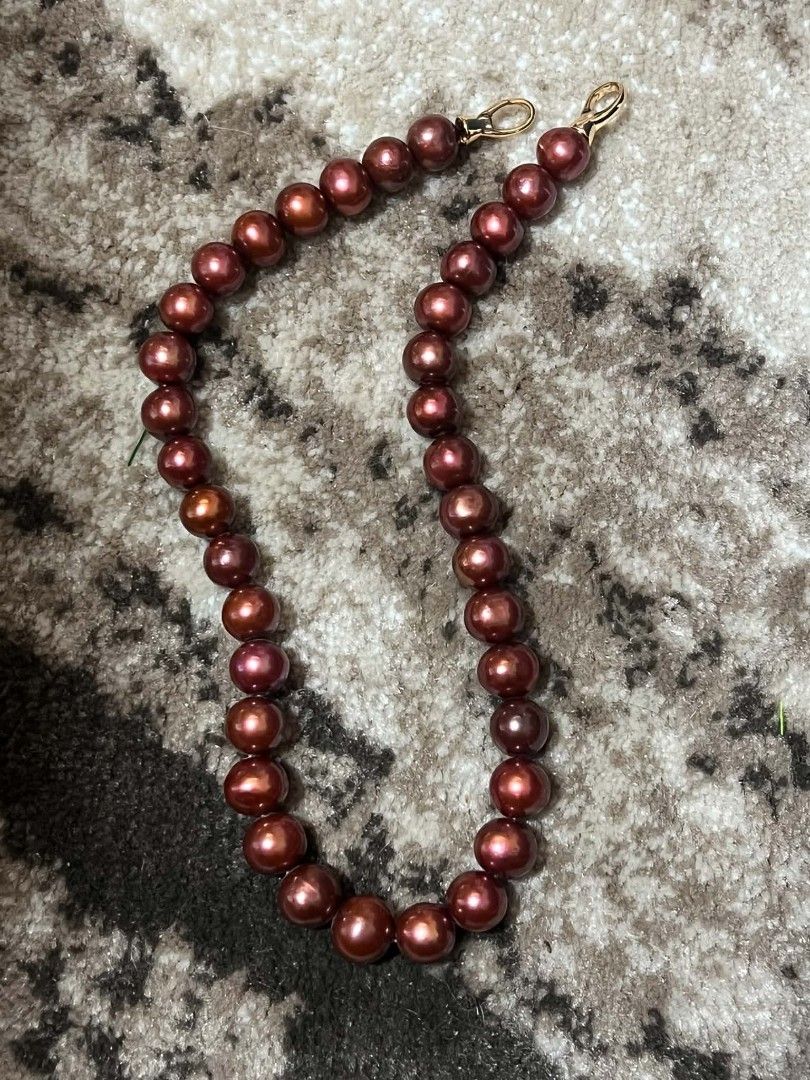 Red Pearl Necklace with Gold Clasp (Category: Necklaces) located in Manila. Submitted by supermom888 (Listing ID 1459870584, Image 1). Description: - Stunning red pearl necklace - Features a simple gold clasp closure - Pearls have a lovely sheen - Adds a vibrant pop of color to any outfit - Versatile for dressing up or down - Makes a perfect gift.
