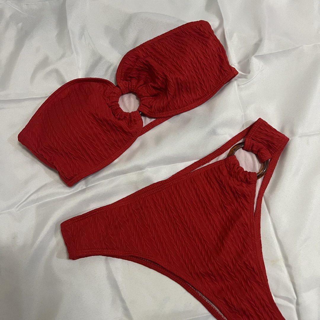 Red Textured Bikini with Ring Detail (Category: Bikinis & Swimsuits) located in Imus. Submitted by niftees.eco (Listing ID 1459749968, Image 1). Description: Red textured bikini set. Size S. Features ring detail and strapless top. High-cut bottoms. Shein brand..