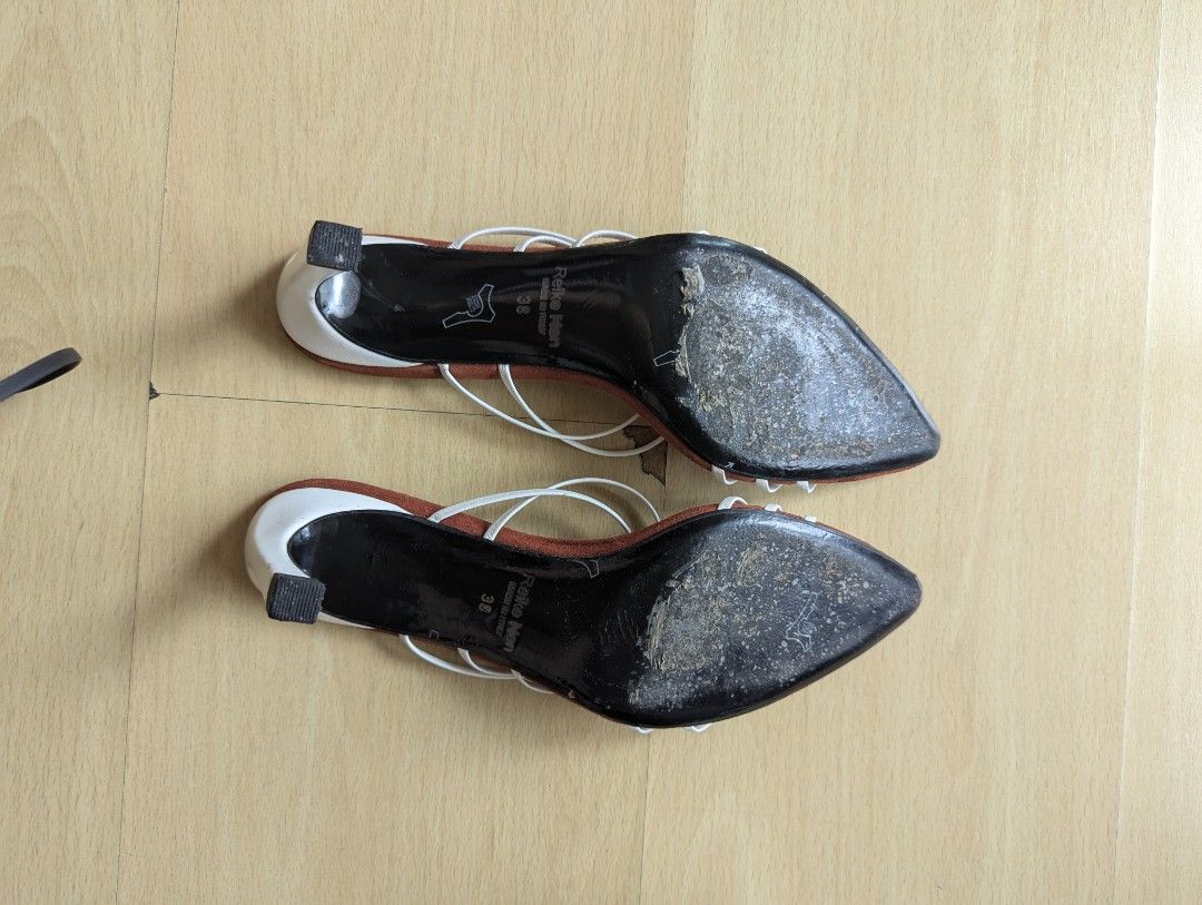 Reike Nen Heels Size 38 (Category: Heels) located in Taguig. Submitted by hlco13 (Listing ID 1459693611, Image 2). Description: - Brand: ReikeNen - Size: 38 - Material: Brown Suede - Design: Pointed toe slip-on mules - Details: White strap accents - Style Tip: Great for dressing up your look.