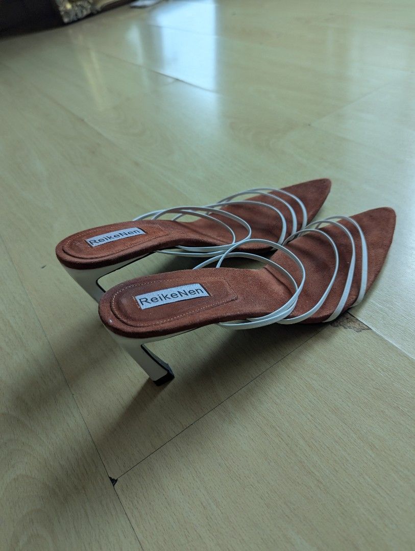 Reike Nen Heels Size 38 (Category: Heels) located in Taguig. Submitted by hlco13 (Listing ID 1459693611, Image 3). Description: - Brand: ReikeNen - Size: 38 - Material: Brown Suede - Design: Pointed toe slip-on mules - Details: White strap accents - Style Tip: Great for dressing up your look.