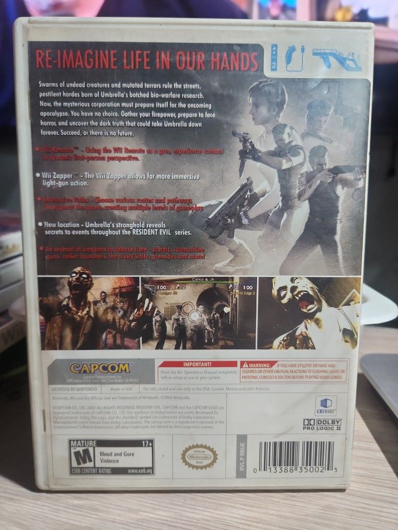 Resident Evil The Umbrella Chronicles Wii Game (Category: Nintendo) located in Quezon City. Submitted by gwift (Listing ID 1459700547, Image 2). Description: - Resident Evil: The Umbrella Chronicles for Nintendo Wii. - Battle swarms of undead creatures and mutated terrorists. - Compatible with Wii Zapper for immersive light-gun gameplay. - Features a new location: Umbrella's stronghold. -selling based on current US market value x 50 -price subjec