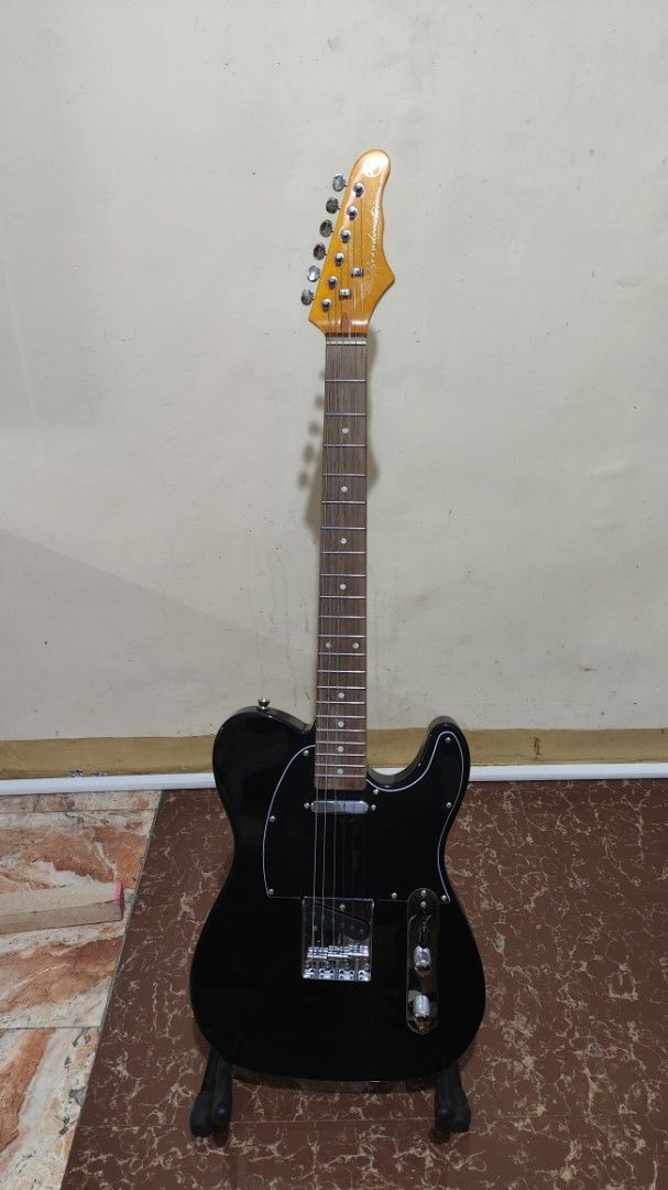 RJ Gigline Broadcaster Electric Guitar (Category: Musical Instruments) located in Paranaque City. Submitted by twangkil (Listing ID 1459865557, Image 1). Description: - Sleek black electric guitar - Classic Telecaster-style body - Smooth maple neck - Shiny chrome hardware - Almost New -With ordinary bag.