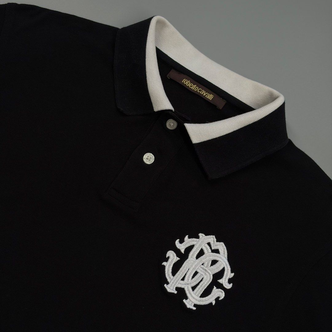 (Sale)Roberto Cavalli Embroidered Monogram (Category: Luxury Apparel) located in Cavite. Submitted by onebeancent (Listing ID 1459895615, Image 3). Description: 🔘R0ber.to C4v.alli RC Monogram Embroidered Size: Small to Medium Dimension: 19" Width | 26" Length Color: Black & White Color Rate: 10/10 Issue: None Condition: Good as new‼️ Before: 1,450php Now: 1,100php Additional Shipping Fee (J&T Small Pouch) 75php Luzon 100php visayas 120php mindan