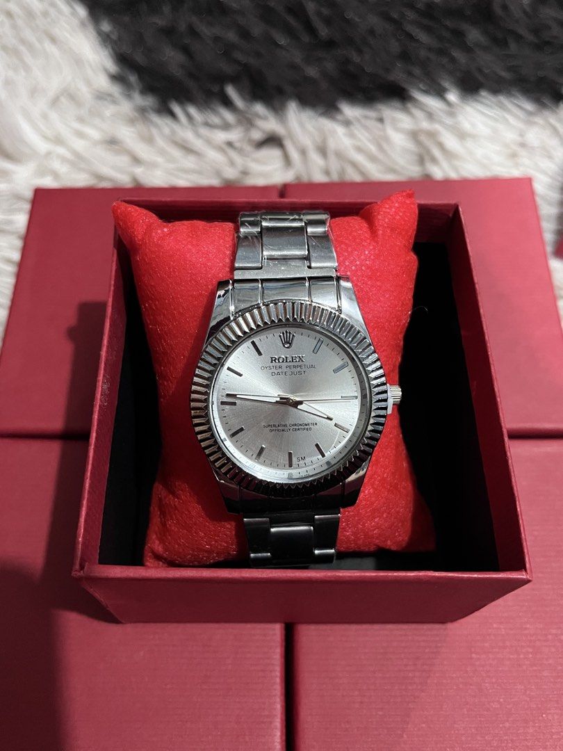 Rolex Oyster Perpetual Datejust Watch (Category: Luxury Watches) located in Manila. Submitted by biancakoo (Listing ID 1459817964, Image 2). Description: - Rolex Oyster Perpetual Datejust - Elegant silver dial - Iconic fluted bezel - Durable stainless steel band - Excellent running condition - Perfect for any occasion and a must-have for collectors.
