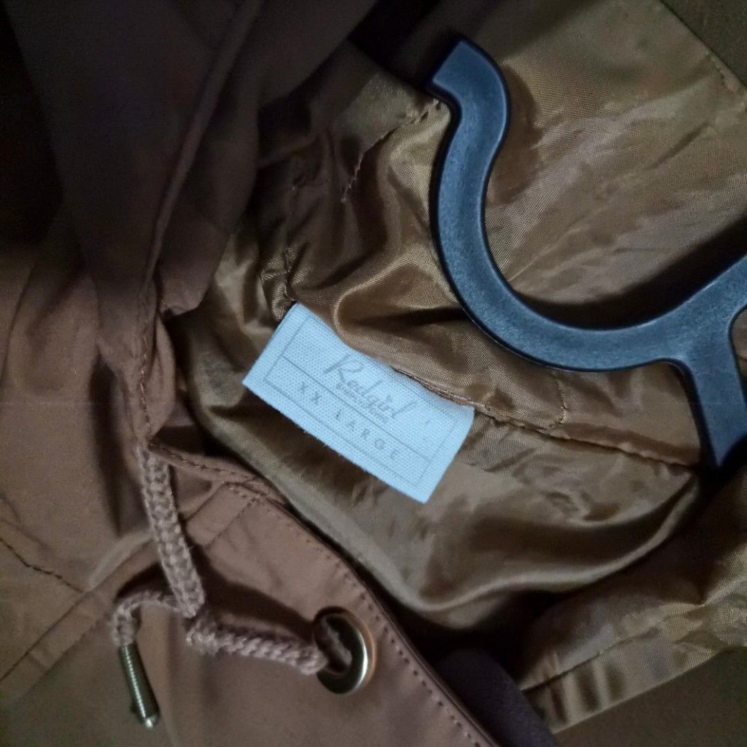 Rust Brown Hooded Parka/Jacket (Category: Coats, Jackets and Outerwear) located in Manila. Submitted by thirdysmom21 (Listing ID 1459895081, Image 3). Description: For Sale: Rust Brown Hooded Parka/Jacket 🤎 ✨ Brand: Redgirl ✨ Size: XXL (based on tag) ✨ Color: Rust Brown ✨ Used but not abused, still in very good condition ✨ Lightweight hooded jacket with adjustable drawstring waist for a flattering fit ✨ Functional zip pockets and snap-button clo