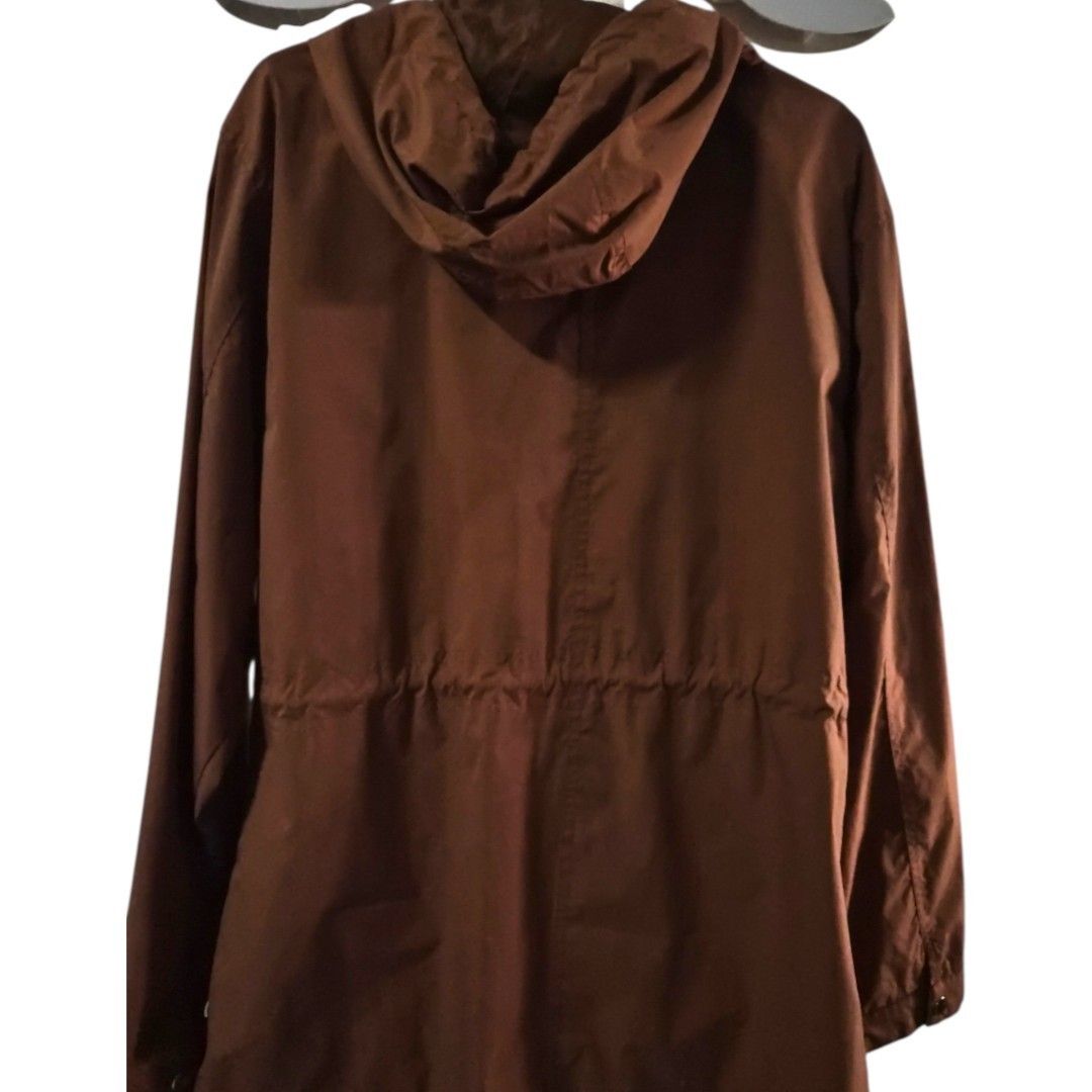 Rust Brown Hooded Parka/Jacket (Category: Coats, Jackets and Outerwear) located in Manila. Submitted by thirdysmom21 (Listing ID 1459895081, Image 2). Description: For Sale: Rust Brown Hooded Parka/Jacket 🤎 ✨ Brand: Redgirl ✨ Size: XXL (based on tag) ✨ Color: Rust Brown ✨ Used but not abused, still in very good condition ✨ Lightweight hooded jacket with adjustable drawstring waist for a flattering fit ✨ Functional zip pockets and snap-button clo