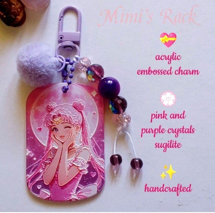 SAILOR MOON INSPIRED GEMSTONE KEYCHAIN / BAG CHARM (Category: Charms) located in Taguig. Submitted by mimisrack (Listing ID 1459800973, Image 2). Description: 💜Add a magical girl sparkle to your bags and keys with this handcrafted Sailor Moon-inspired keychain featuring dreamy pink and purple crystals with celestial kawaii vibes♡ -Perfect for anime lovers, magical girl collectors, and pastel accessory fans! -Sailor Moon-inspired embossed acrylic