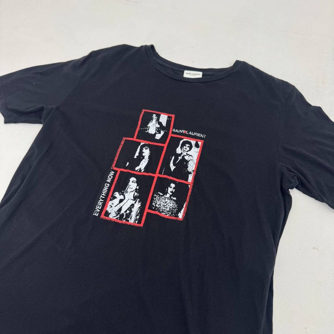 Saint Laurent Paris “Everything Now” Tee (Category: Luxury Apparel) located in Quezon City. Submitted by johnpaulperezzz (Listing ID 1459810991, Image 2). Description: NAME: Saint Laurent Paris “Everything Now” Tee COLOR: Black SIZE: Small FIT: Medium Dimension: Width: 21 Length: 28 Shoulder: 17 Sleeves: 9 Hem: 22 CONDITION: 9/10 ISSUE: -none PRICE: 8k .