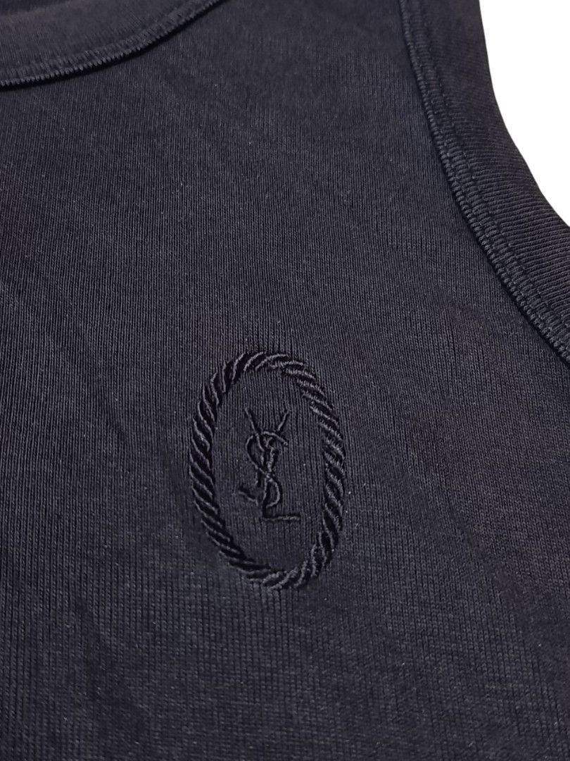 Saint Laurent Paris Sleeveless Tank Top (Category: Luxury Apparel) located in Aliaga. Submitted by thriftkeizieee (Listing ID 1459696049, Image 3). Description: L:22 W:18 EXCELLENT CONDITION ✅ DM ME IF INTERESTED 📩.