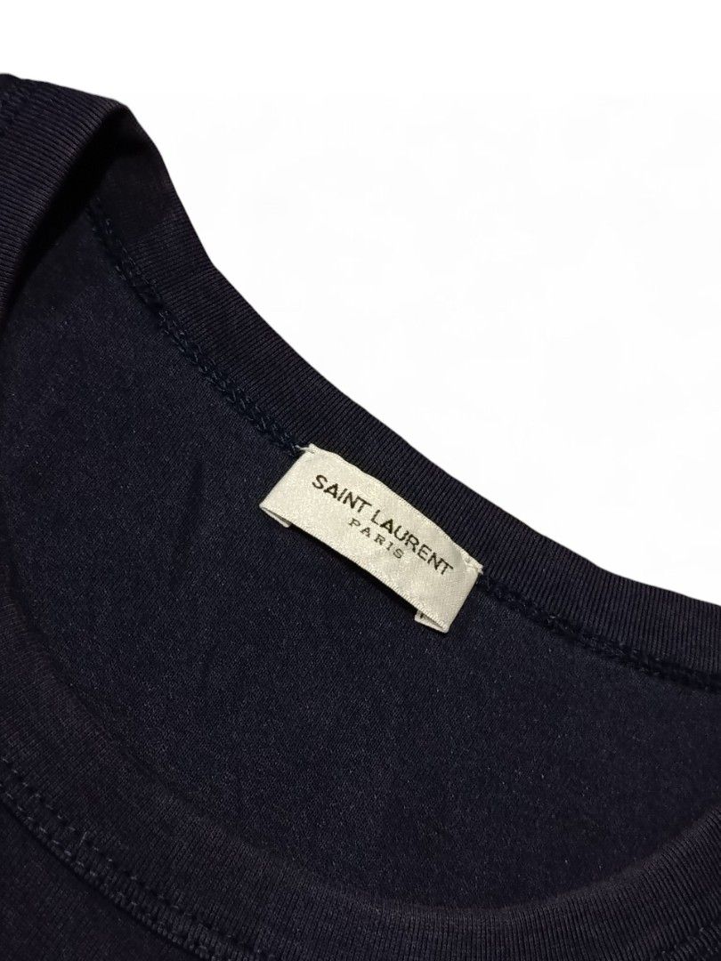 Saint Laurent Paris Sleeveless Tank Top (Category: Luxury Apparel) located in Aliaga. Submitted by thriftkeizieee (Listing ID 1459696049, Image 2). Description: L:22 W:18 EXCELLENT CONDITION ✅ DM ME IF INTERESTED 📩.