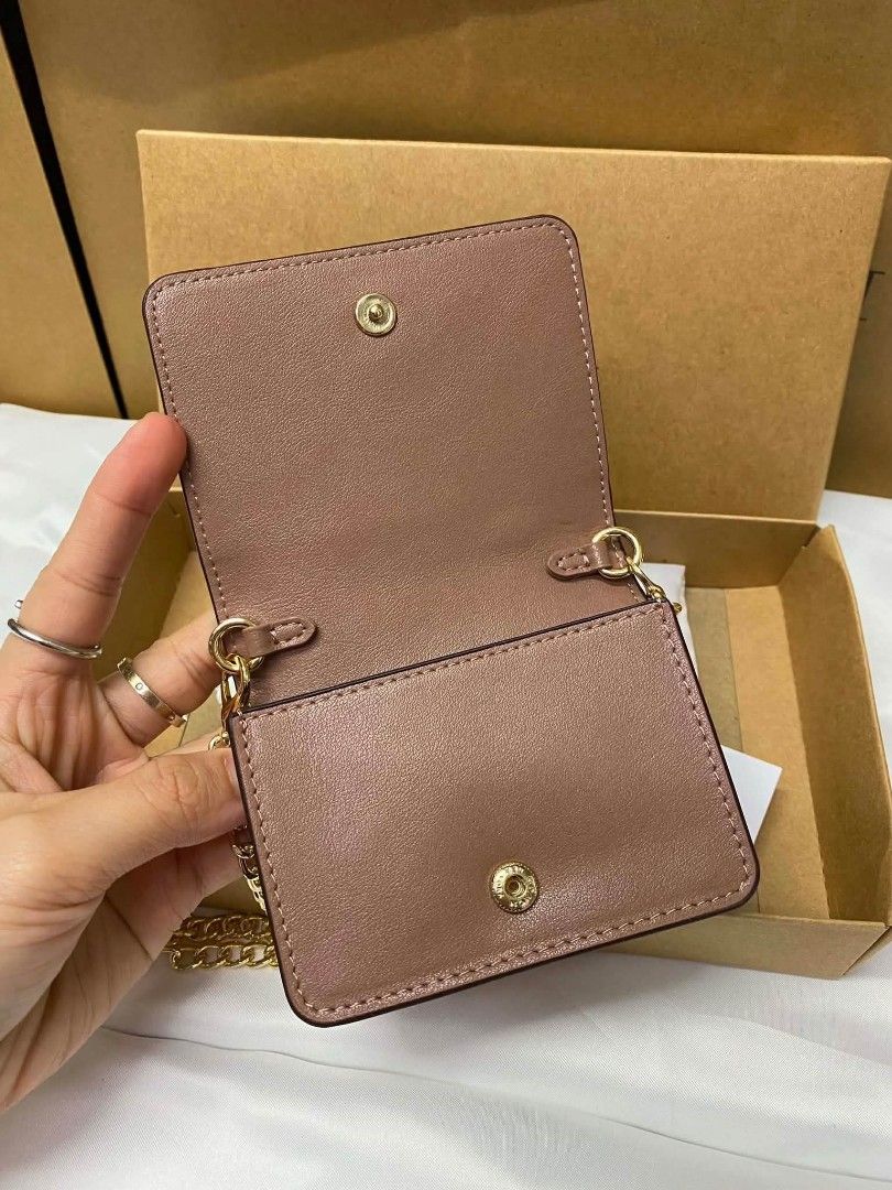 Sale! Coach Mini wallet with Sling (Category: Wallets & Card holders) located in Mandaluyong City. Submitted by priceles (Listing ID 1459689345, Image 3). Description: Brand New with box and paper bag Good for gifts NO COD We will give Discount for 2 or more order.