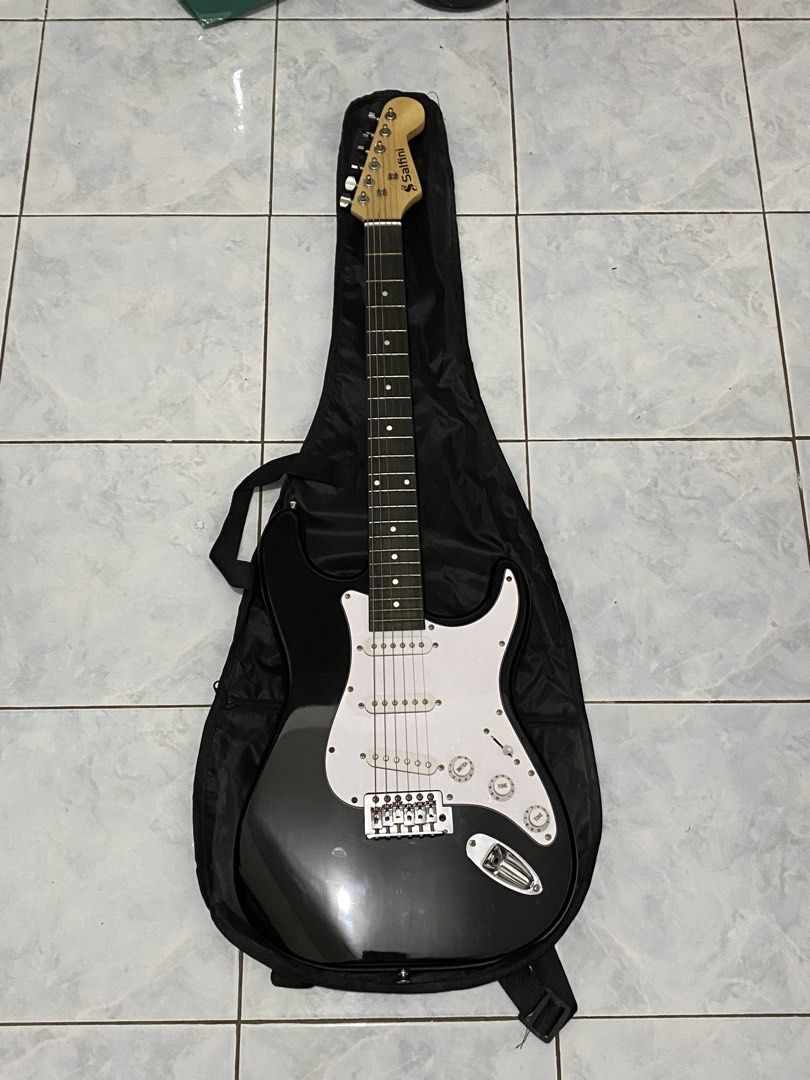 Salfini Guitar (Category: Musical Instruments) located in Cebu City. Submitted by leo02.436 (Listing ID 1459829199, Image 1). Description: Rfs: Need Funds, has been used for cover songs at home, in studio practice, and performance, ready to play, Fixed Price, inclusion: Guitar Bag, Cord, Pick, Pickup Switch Cap.