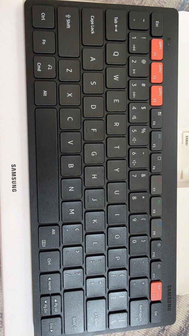 Samsung Smart Keyboard Trio 500 (Category: Computer Keyboard) located in Manila. Submitted by happykyz (Listing ID 1459719134, Image 1). Description: SAMSUNG SMART KEYBOARD TRIO 500 Wireless connectivity for seamless pairing. - Dedicated keys for quick app access and Samsung DeX. - Slim and portable design, ideal for on-the-go use. - Works great with both smartphones and tablets. - Includes original box and quick start guide..