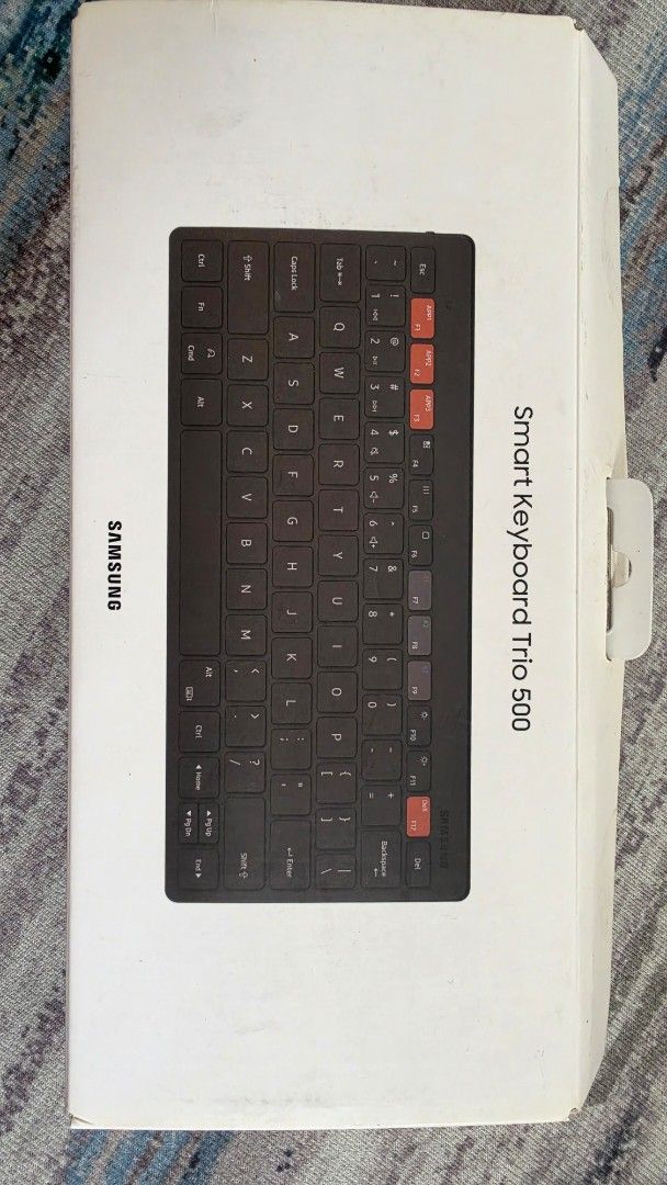 Samsung Smart Keyboard Trio 500 (Category: Computer Keyboard) located in Manila. Submitted by happykyz (Listing ID 1459719134, Image 2). Description: SAMSUNG SMART KEYBOARD TRIO 500 Wireless connectivity for seamless pairing. - Dedicated keys for quick app access and Samsung DeX. - Slim and portable design, ideal for on-the-go use. - Works great with both smartphones and tablets. - Includes original box and quick start guide..