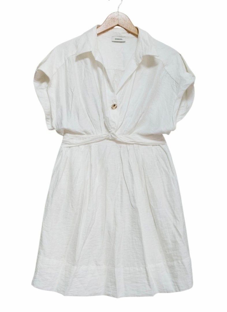 SANDRO Paris light cream Mini dress (Category: Dresses) located in Caloocan City. Submitted by modishthriftstore (Listing ID 1459761008, Image 3). Description: Like New Condition Medium size up to 28 waistline garterized. back with 1 metal gold tone button Linen-Cotton material with lining Loc: Rainbow Village 5 North Caloocan.
