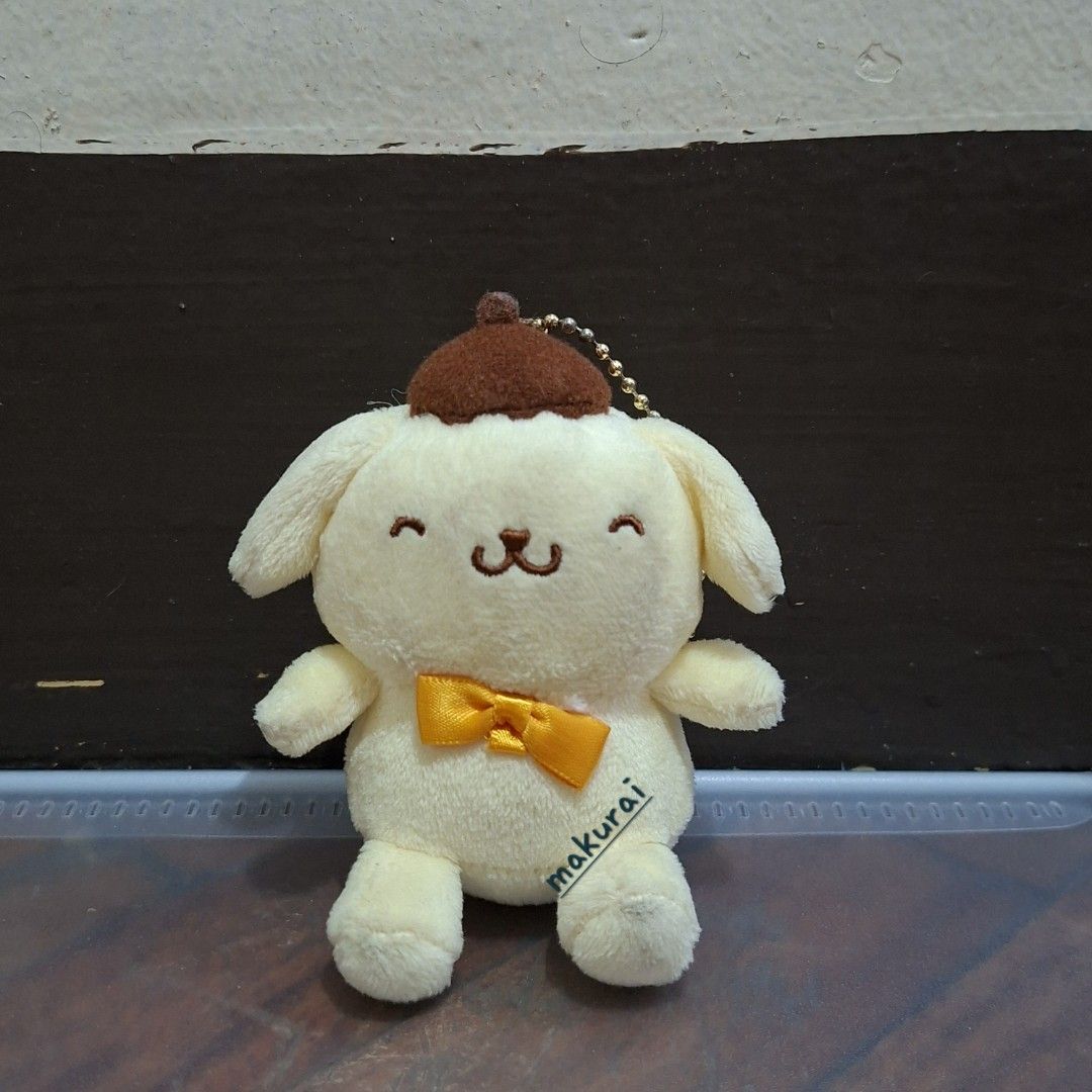 Sanrio Pompompurin Plush Toys Set (Category: Plushies & Soft Toys) located in Manila. Submitted by maku.raish (Listing ID 1459782727, Image 2). Description: - Set of 3 Pompompurin plush toys - Includes mascot size Pompompurin, small Pompompurin with bow, and Pompompurin in fluffy costume - All plush toys feature the signature brown hat - Ideal for Sanrio enthusiasts and collectors - Cute and collectible items ⚠️ Pre-loved item: Please manage expe