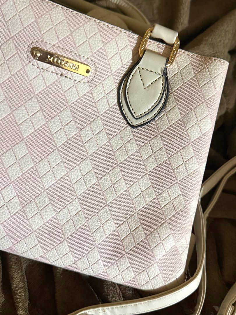 Secosana Pink and Cream Checkered Bag (Category: Shoulder Bags) located in Caloocan City. Submitted by lovedbyzee (Listing ID 1459630428, Image 2). Description: Brand: Secosana Color: Baby Pink & Cream with gold hardware Features: - Metal logo still has its protective plastic cover - Textured checkered pattern exterior - Top carry handles - Includes a detachable and adjustable long strap/sling - Multi-compartment interior with zip pockets and mag