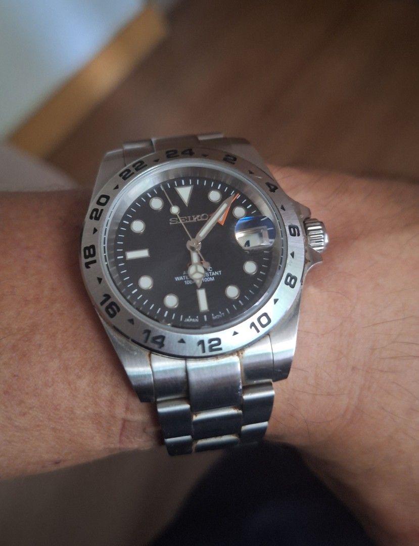 Seiko Automatic Explorer II Homage Watch (Category: Men's Watches) located in Caloocan City. Submitted by vvan_043021 (Listing ID 1459822249, Image 1). Description: - Seikolex- Seiko NH34 movement GMT - Black dial with luminous markers and hands - 24-hour bezel markings - Water resistant up to 100 meters - Stainless steel bracelet - Ideal for everyday wear and travel.