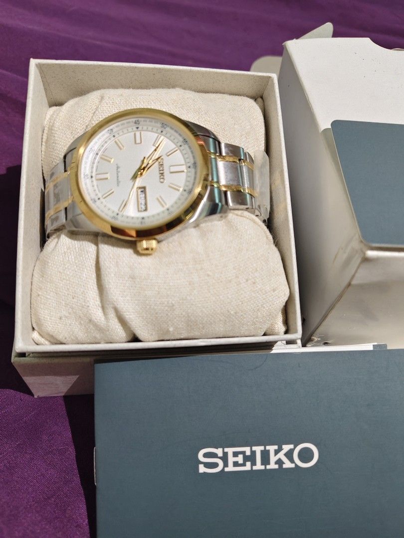 Seiko Automatic Watch Two-Tone Stainless Steel (Category: Men's Watches) located in Manila. Submitted by heyceeguti31141 (Listing ID 1459898616, Image 2). Description: - Seiko Automatic Watch - Two-tone Stainless Steel Bracelet - White Dial with Gold Accents - Includes Original Box - Includes Original Warranty Card.