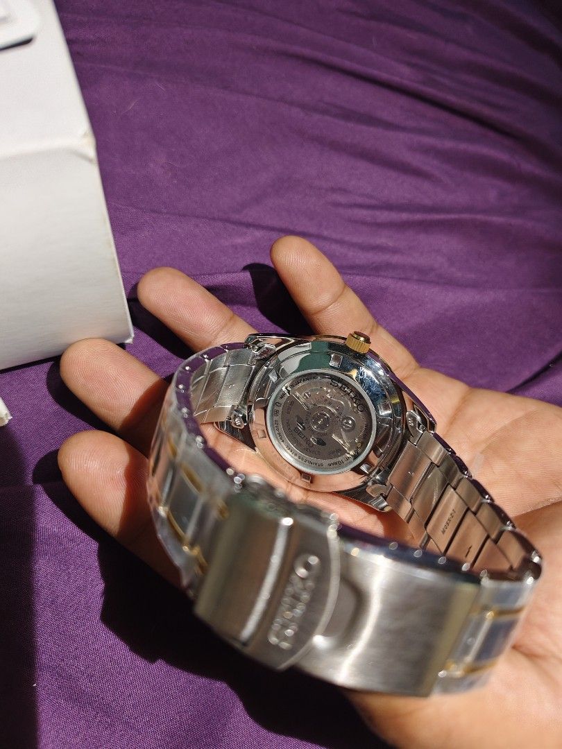 Seiko Automatic Watch Two-Tone Stainless Steel (Category: Men's Watches) located in Manila. Submitted by heyceeguti31141 (Listing ID 1459898616, Image 3). Description: - Seiko Automatic Watch - Two-tone Stainless Steel Bracelet - White Dial with Gold Accents - Includes Original Box - Includes Original Warranty Card.