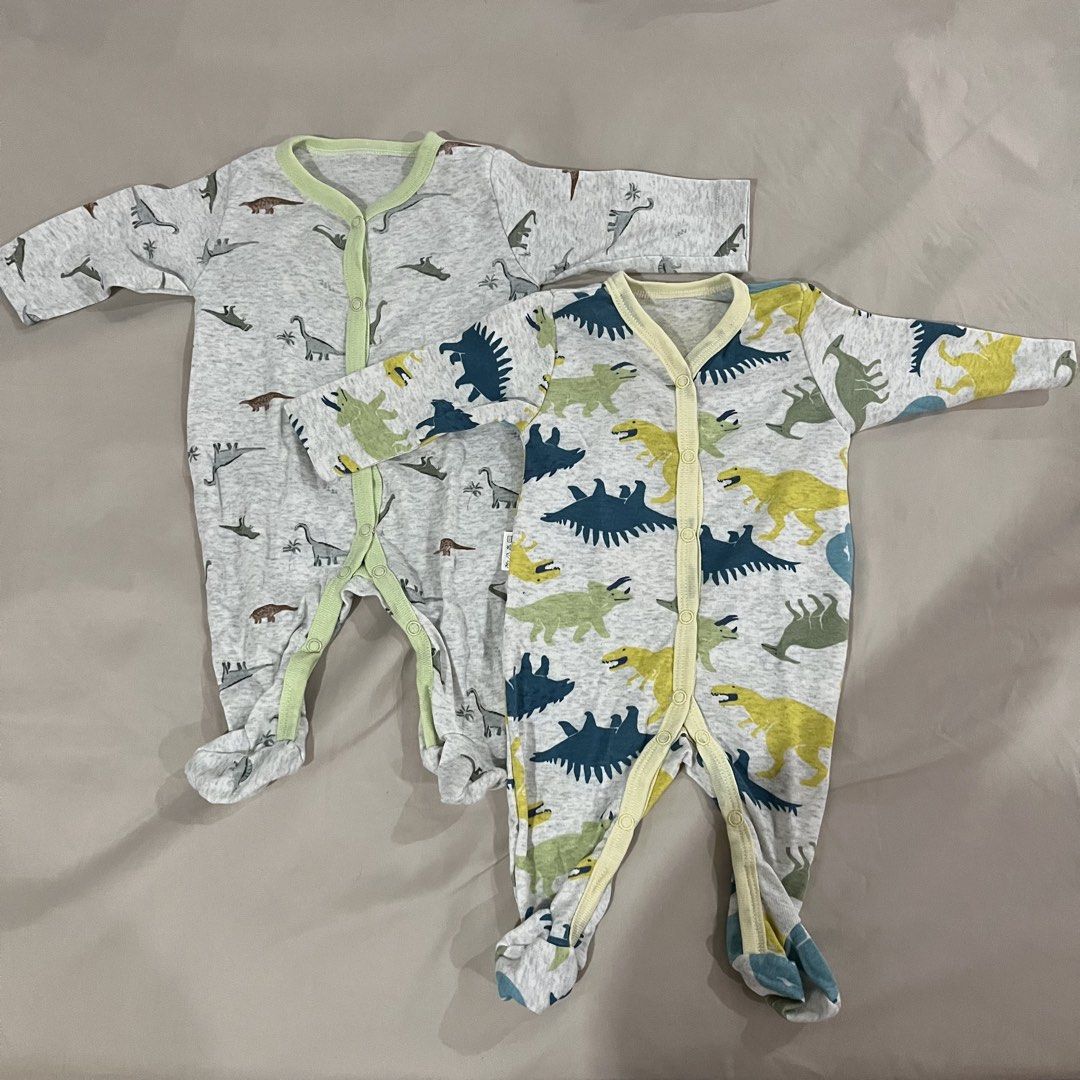 [SET] Baby Dinosaur Footed Frogsuit (size 0-3m) (Category: Babies & Kids Fashion) located in Makati City. Submitted by happycloset5 (Listing ID 1459767142, Image 1). Description: - Set of 2 cute baby sleepers - Adorable dinosaur prints - Made of 100% soft cotton - Footed design for extra warmth - Easy snap-front closure for hassle-free dressing - Keeps your little one cozy and comfortable.