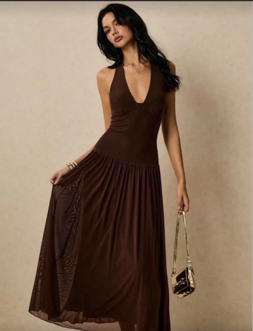 Shein Brown Halter Neck Maxi Dress (Category: Dresses) located in Pasig City. Submitted by helpmedispose (Listing ID 1459731978, Image 1). Description: - Flowy brown maxi dress - Halter neckline - Sheer overlay on skirt - Ideal for night outs or special occasions - Comfortable and stylish - Fits true to size.