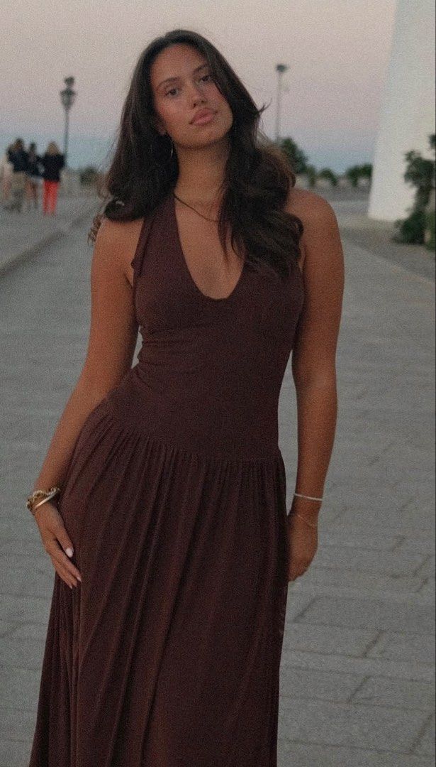 Shein Brown Halter Neck Maxi Dress (Category: Dresses) located in Pasig City. Submitted by helpmedispose (Listing ID 1459731978, Image 3). Description: - Flowy brown maxi dress - Halter neckline - Sheer overlay on skirt - Ideal for night outs or special occasions - Comfortable and stylish - Fits true to size.