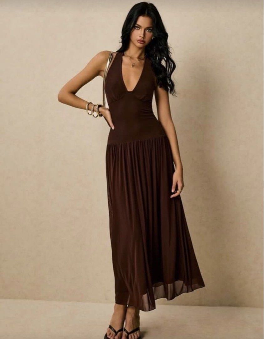 Shein Brown Halter Neck Maxi Dress (Category: Dresses) located in Pasig City. Submitted by helpmedispose (Listing ID 1459731978, Image 2). Description: - Flowy brown maxi dress - Halter neckline - Sheer overlay on skirt - Ideal for night outs or special occasions - Comfortable and stylish - Fits true to size.