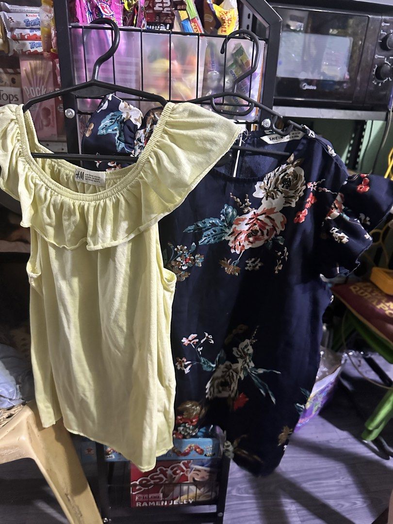 Shein Floral Top & H&M Yellow Top Bundle (Category: Kids Wardrobes & Storage) located in Manila. Submitted by edgiedge (Listing ID 1459868385, Image 3). Description: - Bundle of two tops - Navy blue Shein top with colorful floral print and flutter sleeves - Light yellow H&M off-shoulder top with ruffled neckline - Both are great for casual wear - Selling as a set ₱50.